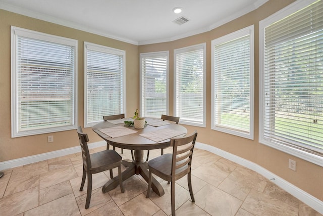 510 Pearl View Ln, Pinehurst, TX 77362 - dining area with crown molding and baseboards