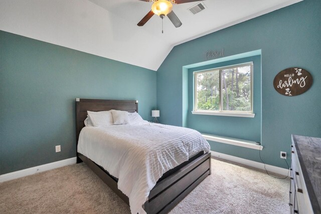 510 Pearl View Ln, Pinehurst, TX 77362 - carpeted bedroom featuring vaulted ceiling, baseboards, and a ceiling fan