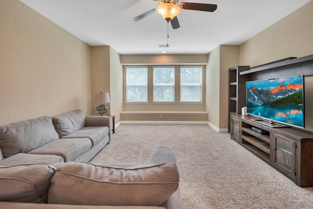 510 Pearl View Ln, Pinehurst, TX 77362 - living room with a ceiling fan, carpet, and baseboards