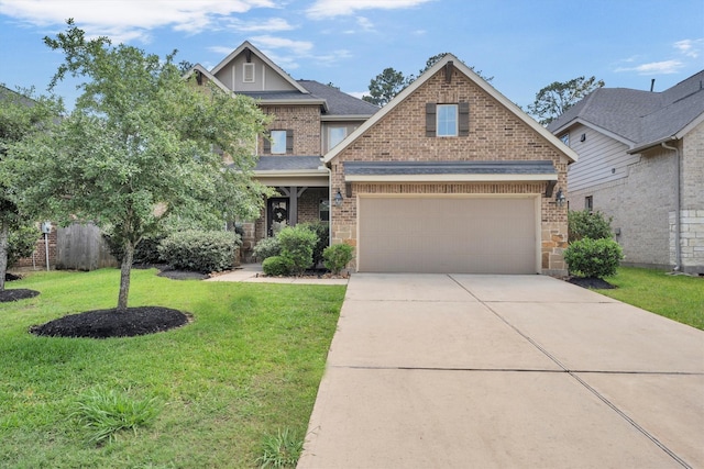510 Pearl View Ln, Pinehurst, TX 77362 - craftsman-style home with brick siding, concrete driveway, a front yard, and roof with shingles