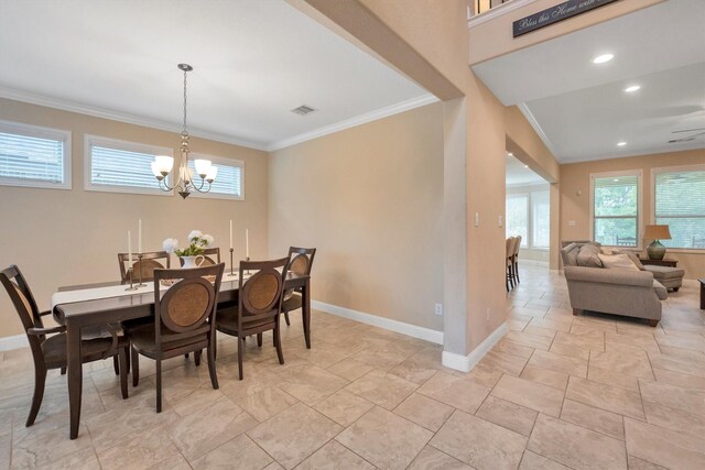 510 Pearl View Ln, Pinehurst, TX 77362 - dining room featuring a chandelier, ornamental molding, baseboards, and light stone finish floors