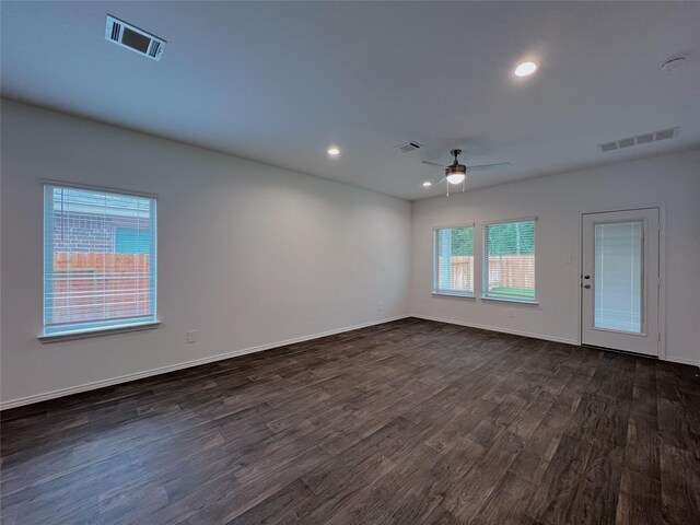 21310 Black Leaf Dr, New Caney, TX 77357 - unfurnished room with dark wood-type flooring, a ceiling fan, baseboards, and recessed lighting