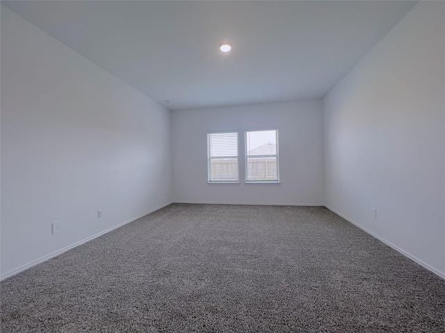 21310 Black Leaf Dr, New Caney, TX 77357 - spare room featuring carpet, baseboards, and recessed lighting