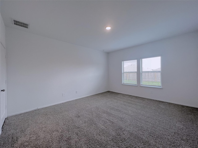21310 Black Leaf Dr, New Caney, TX 77357 - unfurnished room with carpet floors, baseboards, and recessed lighting