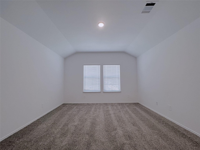 21310 Black Leaf Dr, New Caney, TX 77357 - bonus room with vaulted ceiling, carpet floors, and baseboards