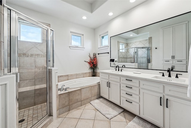 822 Reinicke St, Houston, TX 77007 - bathroom with a garden tub, a shower stall, recessed lighting, double vanity, and tile patterned flooring