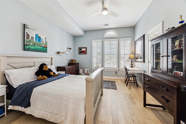 822 Reinicke St, Houston, TX 77007 - bedroom featuring light wood-type flooring, baseboards, and ceiling fan