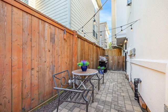 822 Reinicke St, Houston, TX 77007 - view of patio / terrace featuring fence and a grill