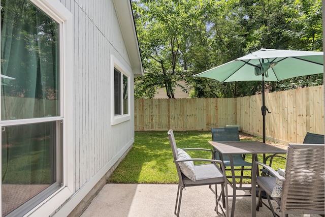13 Leverwood Ct, The Woodlands, TX 77381 - view of patio with outdoor dining space