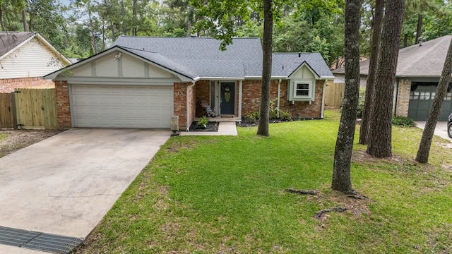 13 Leverwood Ct, The Woodlands, TX 77381 - view of front of house with an attached garage, concrete driveway, brick siding, and a shingled roof