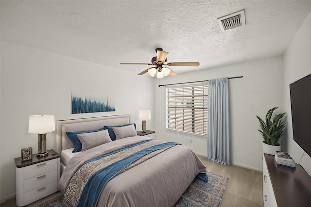 bedroom with carpet flooring, baseboards, and ceiling fan