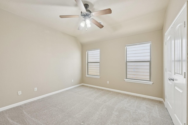 12885 Andromeda Ct, Willis, TX 77318 - unfurnished room with light colored carpet, ceiling fan, and baseboards