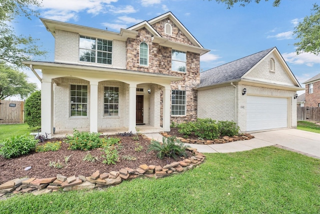 12139 Canyon Arbor Way, Houston, TX 77095 - traditional home featuring a porch, brick siding, concrete driveway, and an attached garage