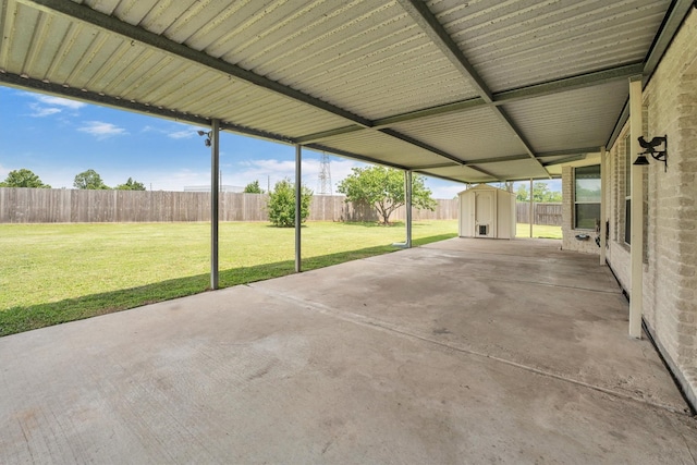 12139 Canyon Arbor Way, Houston, TX 77095 - view of patio / terrace with a storage shed and an outdoor structure