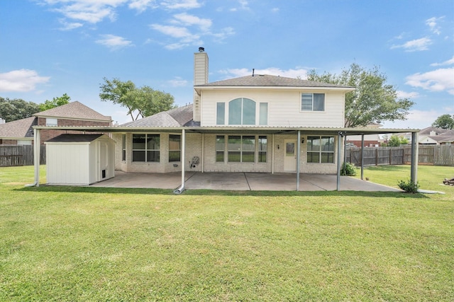 12139 Canyon Arbor Way, Houston, TX 77095 - rear view of house featuring a shed, a patio, a chimney, and an outbuilding