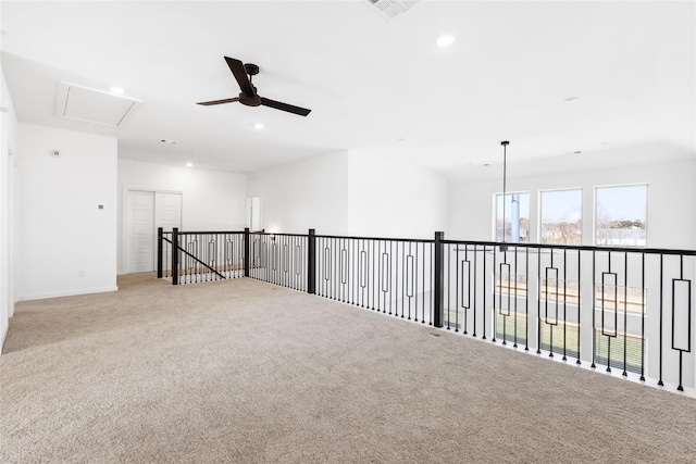 404 Kendall Crest Dr, Alvin, TX 77511 - carpeted spare room featuring attic access, a ceiling fan, recessed lighting, and baseboards