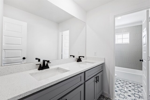 404 Kendall Crest Dr, Alvin, TX 77511 - bathroom featuring double vanity and toilet