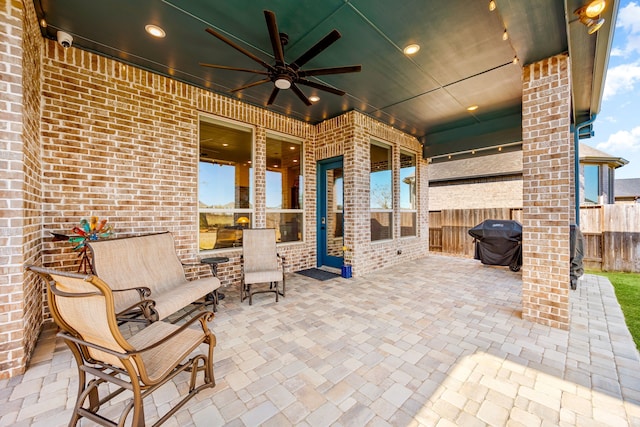 7114 Clubtail Rd, Katy, TX 77493 - view of patio with fence, a ceiling fan, and area for grilling