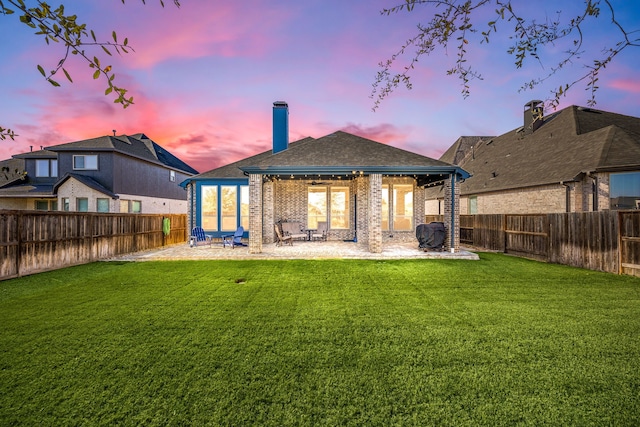 7114 Clubtail Rd, Katy, TX 77493 - back of house with a patio, a chimney, brick siding, and a ceiling fan