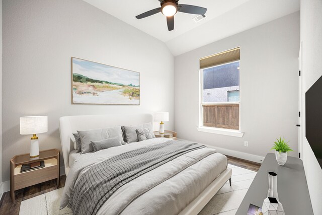 7114 Clubtail Rd, Katy, TX 77493 - bedroom with wood finished floors, baseboards, lofted ceiling, and ceiling fan
