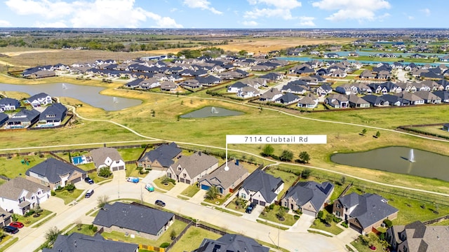 7114 Clubtail Rd, Katy, TX 77493 - aerial overview of property's location featuring nearby suburban area and a large body of water