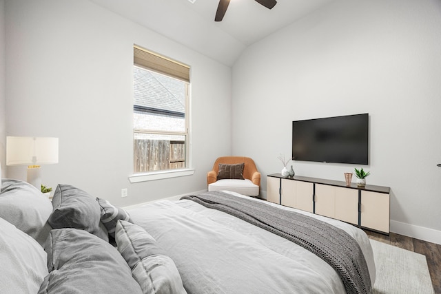 7114 Clubtail Rd, Katy, TX 77493 - bedroom featuring wood finished floors, baseboards, lofted ceiling, and ceiling fan
