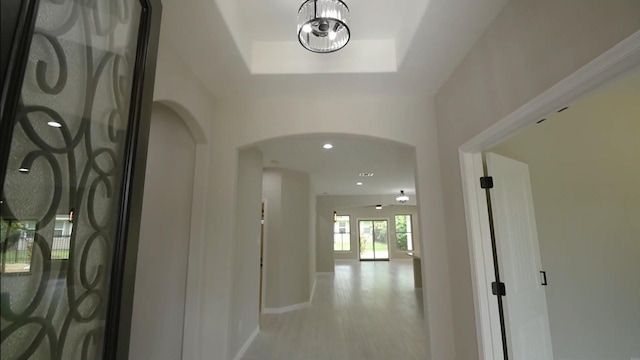2716 Garapan St, Houston, TX 77091 - hallway with arched walkways, baseboards, and recessed lighting