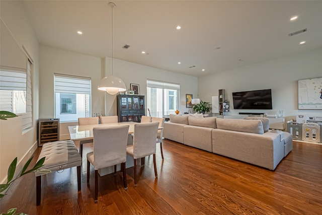 1510 Yale St Unit B, Houston, TX 77008 - dining space with wine cooler, wood finished floors, and recessed lighting