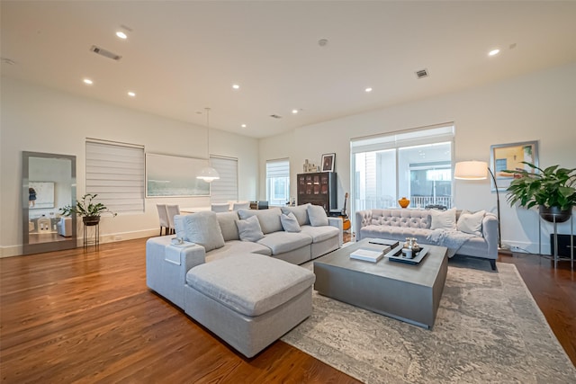 1510 Yale St Unit B, Houston, TX 77008 - living room featuring dark wood-style floors, recessed lighting, and baseboards