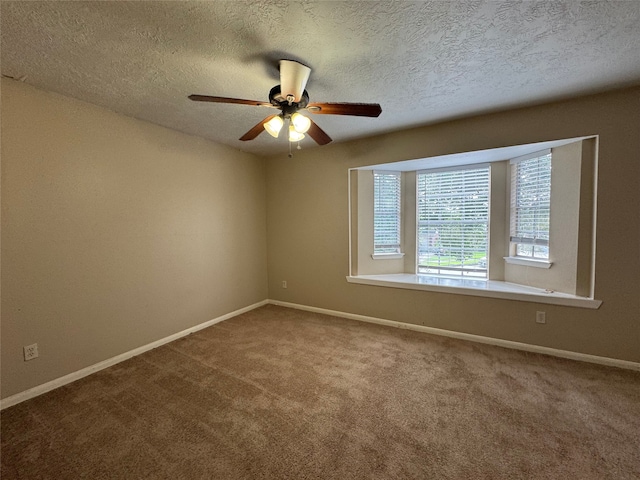 3505 Stonegate Cir, Pearland, TX 77584 - carpeted empty room with a ceiling fan, baseboards, and a textured ceiling