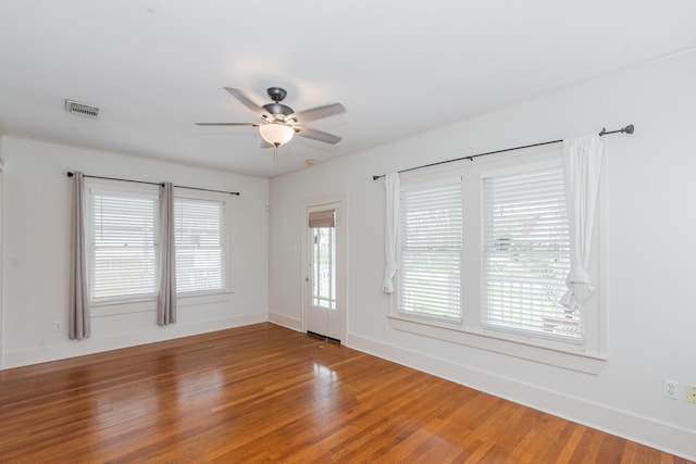 1510 W 21st St, Houston, TX 77008 - spare room with light wood-type flooring, ceiling fan, and baseboards