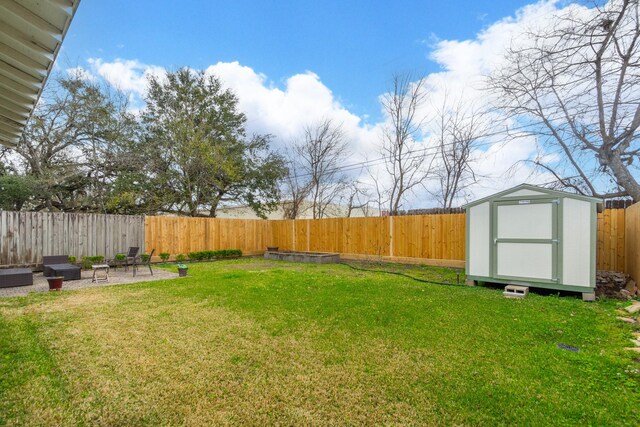 1510 W 21st St, Houston, TX 77008 - view of yard featuring a storage unit, an outbuilding, and a patio area