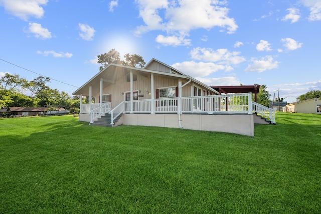 381 N Shady Oaks Dr, Point Blank, TX 77364 - rear view of house featuring board and batten siding, a lawn, a porch, and stairway