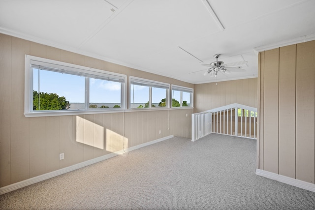 381 N Shady Oaks Dr, Point Blank, TX 77364 - carpeted spare room with baseboards, a ceiling fan, and ornamental molding