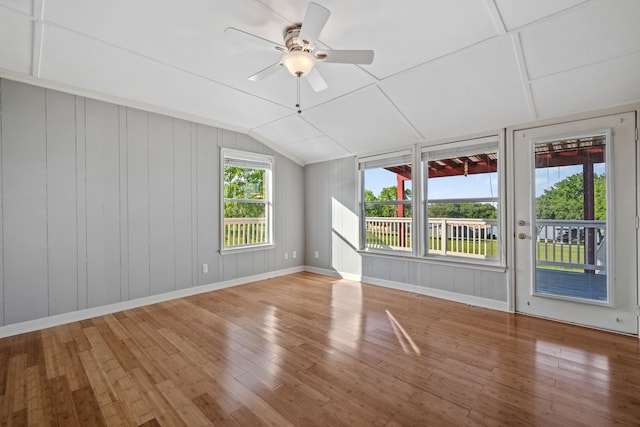 381 N Shady Oaks Dr, Point Blank, TX 77364 - unfurnished room with ceiling fan, lofted ceiling, wood finished floors, and baseboards