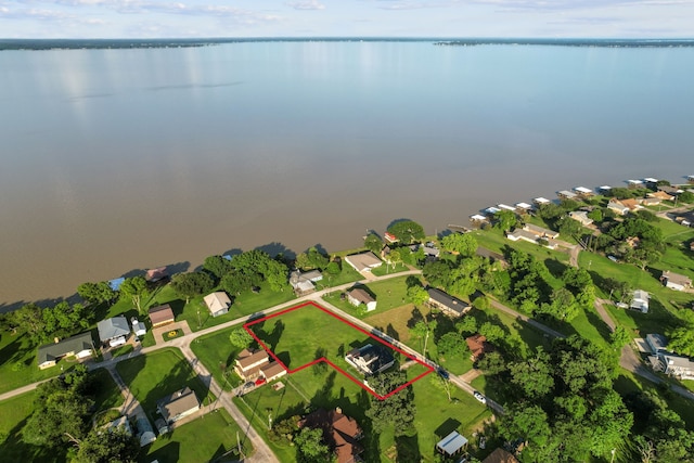 381 N Shady Oaks Dr, Point Blank, TX 77364 - aerial view of residential area with a large body of water and property boundaries highlighted