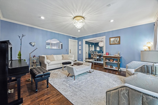living room with a chandelier, dark wood-style floors, ornamental molding, recessed lighting, and baseboards