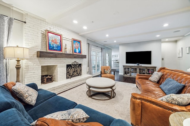 living area with a fireplace, wood finished floors, recessed lighting, beam ceiling, and baseboards
