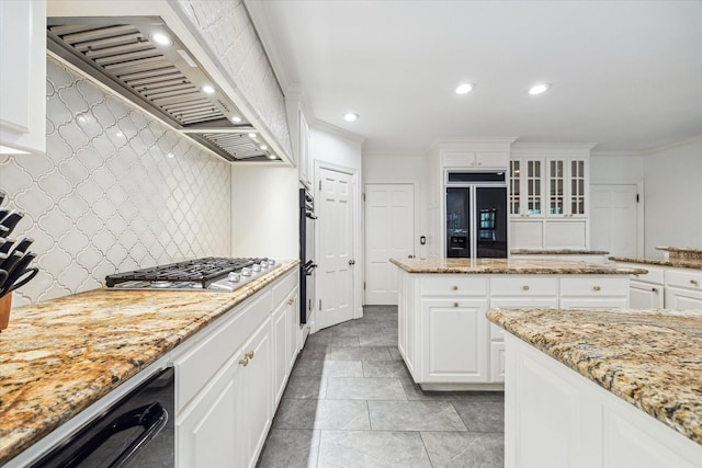 kitchen featuring paneled fridge, custom range hood, dishwasher, crown molding, and decorative backsplash