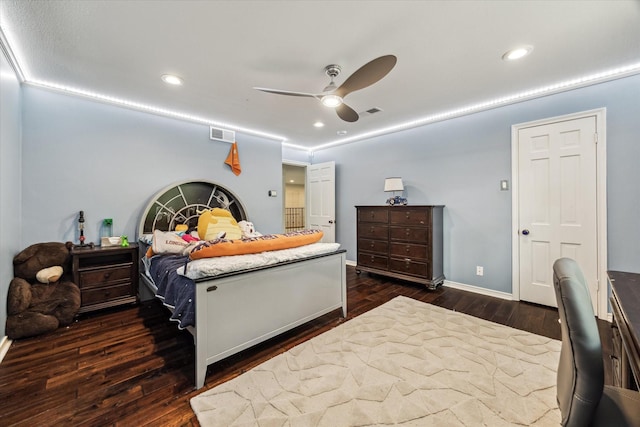 bedroom featuring dark wood-type flooring, a ceiling fan, and recessed lighting