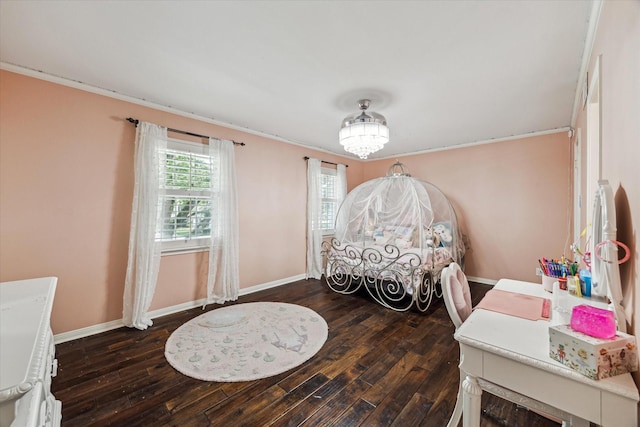 dining space featuring dark wood-style floors, baseboards, and a chandelier