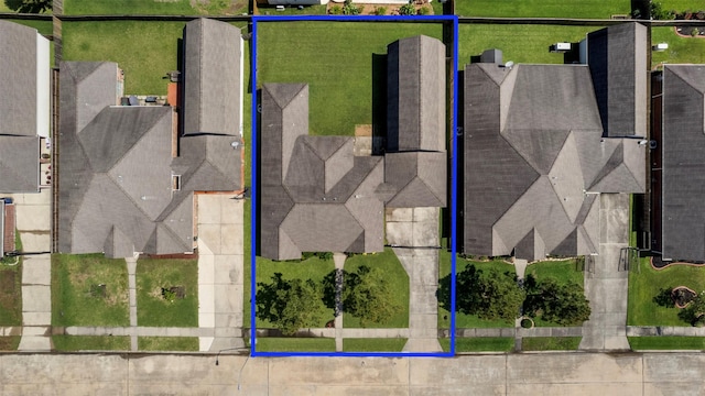 aerial view of property and surrounding area with property boundaries highlighted