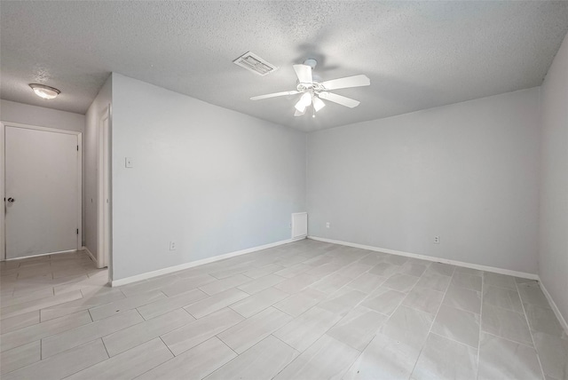 11526 Sands Point Dr, Houston, TX 77072 - empty room with a textured ceiling, ceiling fan, and baseboards