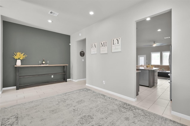 11510 Gingerland Dr, Conroe, TX 77304 - empty room with light tile patterned flooring, recessed lighting, baseboards, and ceiling fan