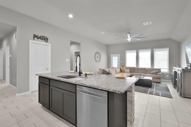 11510 Gingerland Dr, Conroe, TX 77304 - kitchen featuring dishwasher, a sink, ceiling fan, open floor plan, and light stone counters