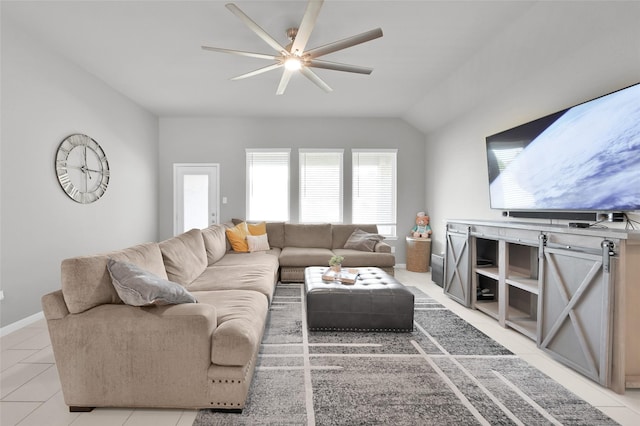 11510 Gingerland Dr, Conroe, TX 77304 - living room featuring a ceiling fan, light tile patterned floors, lofted ceiling, and baseboards