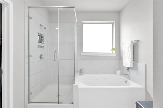 11510 Gingerland Dr, Conroe, TX 77304 - full bath featuring a garden tub and a shower stall