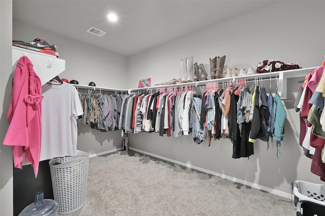 11510 Gingerland Dr, Conroe, TX 77304 - walk in closet with carpet floors
