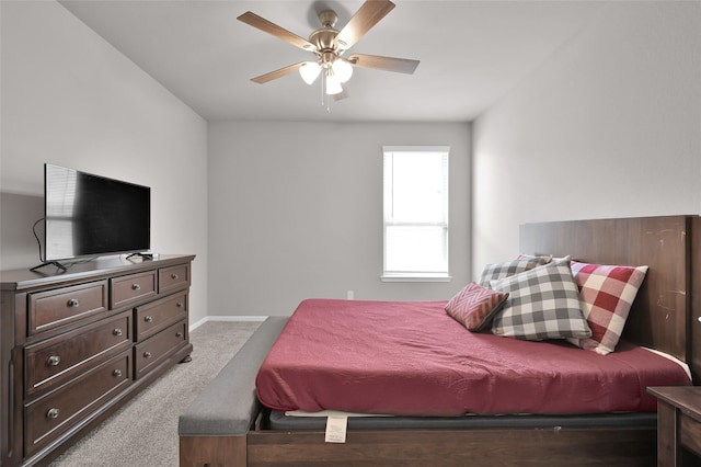 11510 Gingerland Dr, Conroe, TX 77304 - bedroom with carpet floors, a ceiling fan, and baseboards