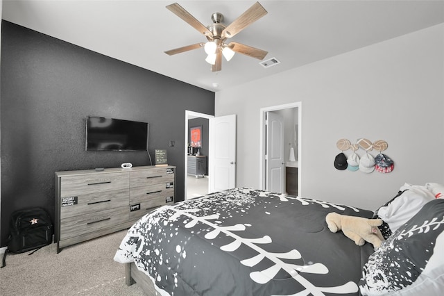 11510 Gingerland Dr, Conroe, TX 77304 - carpeted bedroom featuring ceiling fan and ensuite bathroom
